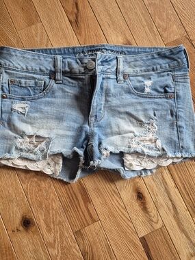 American Eagle Outfitters Light Blue Distressed Denim Shorts with Lace Inset